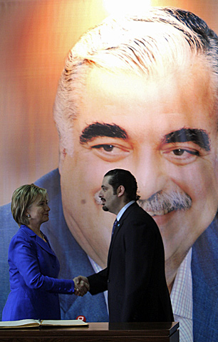 U.S. Secretary of State Hillary Clinton meets with Lebanese Prime Minister Saad Hariri (the son of Rafik) in April 2009, in advance of a critical election. Saad Hariri has retracted some of his earlier comments about Syrian involvement in his father's death but the West is still applying pressure. (Bilal Hussein/Associated Press)