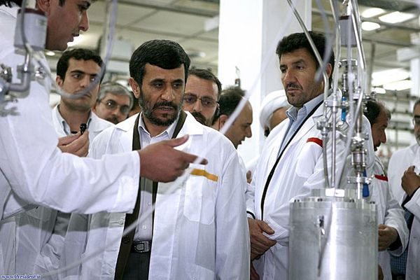 Photo: Iranian President Mahmoud Ahmadinejad, center, listens to a technician during his visit of the Natanz Uranium Enrichment Facility some 200 miles south of Tehran on April 8, 2008. Credit: Iranian's President's office / Associated Press