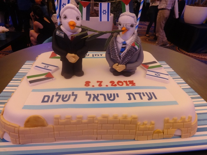 The cake at the Ha'aretz Peace Conference. This photo was taken I was in the bomb shelter when the siren went off near the end of the conference.  photo by Rhonda Spivak