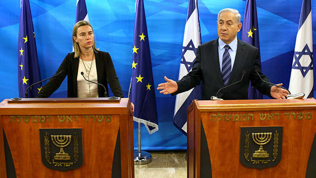 Prime Minister Netanyahu, right, warned EU foreign policy chief Mogherini, left, against such a move (Photo: Amit Shaabi)