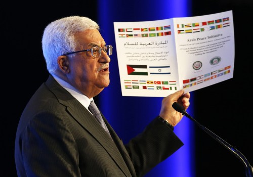 Palestinian President Mahmoud Abbas speaks at the World Economic Forum on the Middle East and North Africa at the King Hussein Convention Center at the Dead Sea in Jordan Sunday, May 26, 2013.  (AP Photo/Pool, Jim Young) 