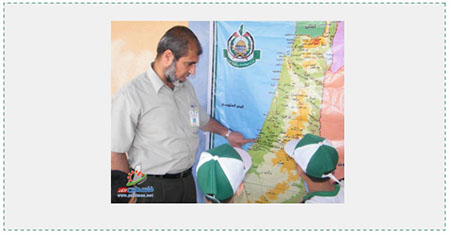 "Educating" the younger generation with maps: A counsellor in a Hamas summer camp in the Gaza Strip points to a map of "Palestine" issued by Hamas which ignores the existence of the State of Israel (Filastin al-A'an, June 8, 2016). Important Israeli cities do not appear on the map. Jaffa, considered a "Palestinian city," replaces Tel Aviv, and Um-Khaled, an Arab village which no longer exists, replaces Netanya.