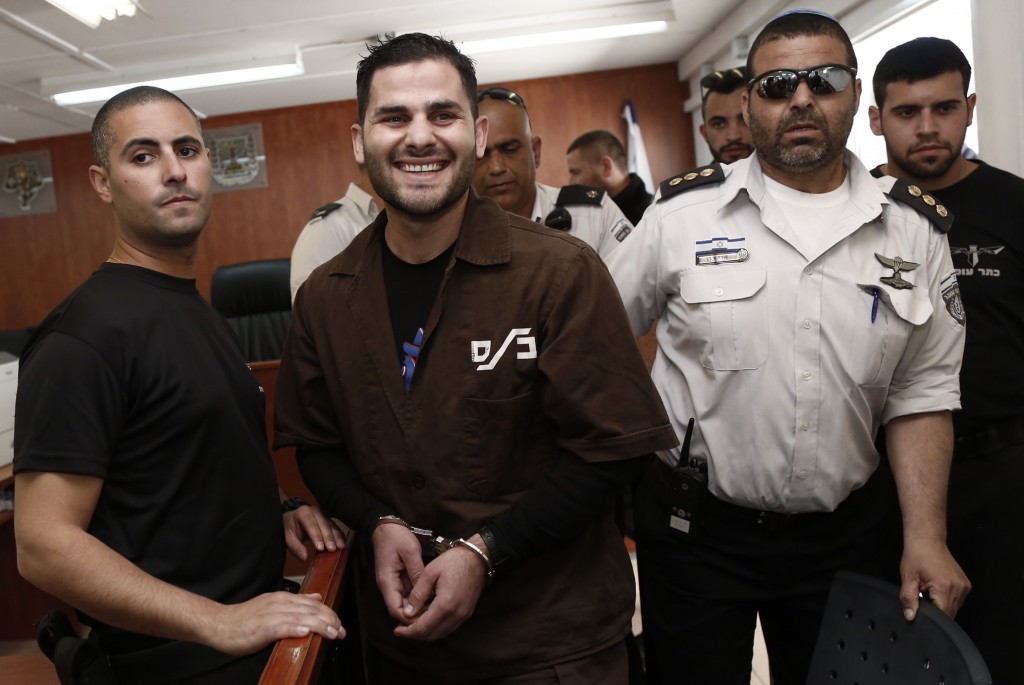 Picture of  a smiling Maher al-Hashlamon as he was convicted of the murder of Dalya Lemkus