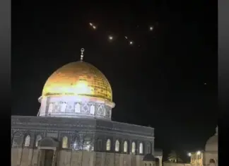 The PLO-PA-Iranian Terror Alliance The Dome of the Rock atop the Temple Mount in Jerusalem’s Old City, with the lights of missile interceptions visible in the night sky, early on April 14, 2024, after Iran fired ballistic missiles at Israel. (Times of Israel, Social media/X; used in accordance with Clause 27a of the Copyright Law)