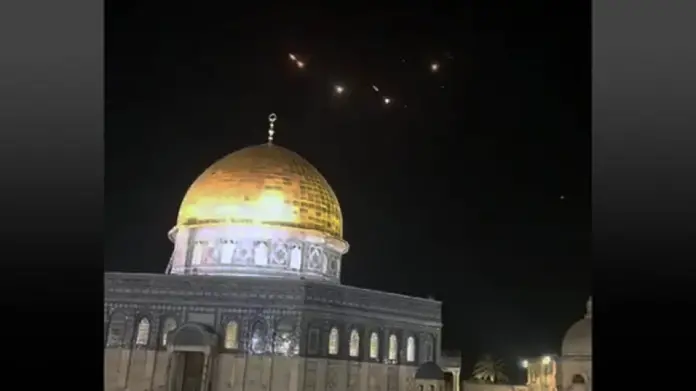 The Dome of the Rock atop the Temple Mount in Jerusalem’s Old City, with the lights of missile interceptions visible in the night sky, early on April 14, 2024, after Iran fired ballistic missiles at Israel. (Times of Israel, Social media/X; used in accordance with Clause 27a of the Copyright Law)