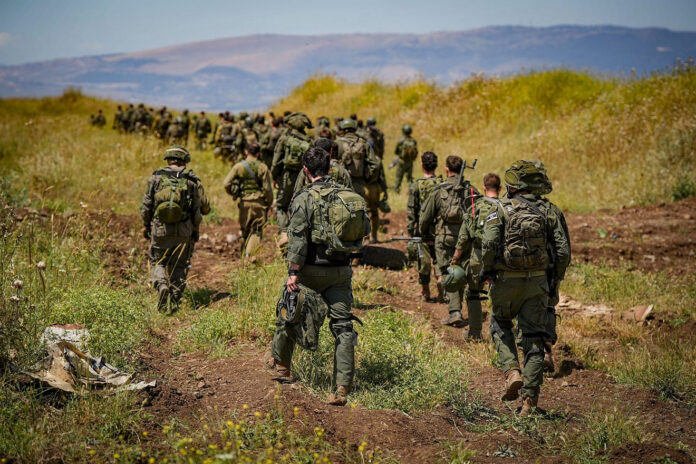 Israeli reserve soldiers take part in a military drill in the Golan Heights in northern Israel on May 8, 2024. Photo by Ayal Margolin/Flash90.