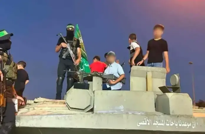 Children experimenting with means of warfare alongside operatives of the terrorist organization Hamas (photo credit: IDF SPOKESPERSON UNIT)