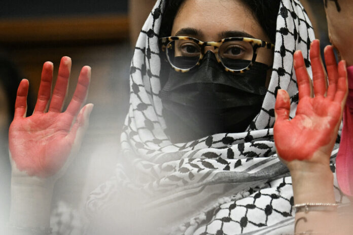 Pro-Hamas activists demonstrate during a House Judiciary Subcommittee on the Constitution and Limited Government hearing on antisemitism on college campuses, Capitol Hill, Washington, D.C., May 15, 2024. Photo by Jim Watson/AFP via Getty Images.