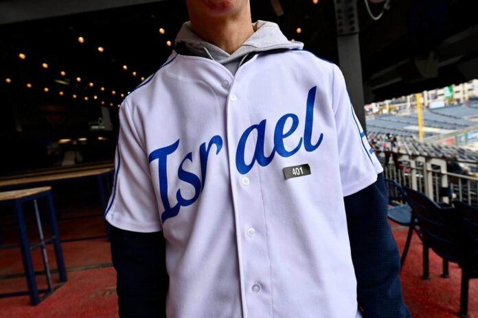 A participant at the “We Stand Together” rally for Jewish unity and Israel at the Nationals Park baseball stadium in Washington, D.C., on Nov. 10, 2024. Photo by Abby Greenawalt.