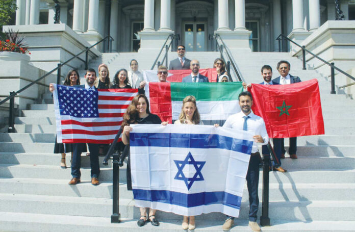 MEMBERS OF a delegation of young leaders from the Middle East pose on the steps of the Capitol in Washington, promoting the third anniversary of the Abraham Accords, just three weeks before the October 7, 2023 atrocities. (photo credit: ISRAEL-is and the American Jewish Committee)