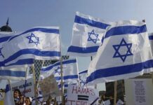 Hamas out: White flag and Star of David at mass demonstrations in Gaza